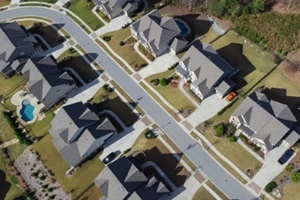 row of two story houses with swimming pool