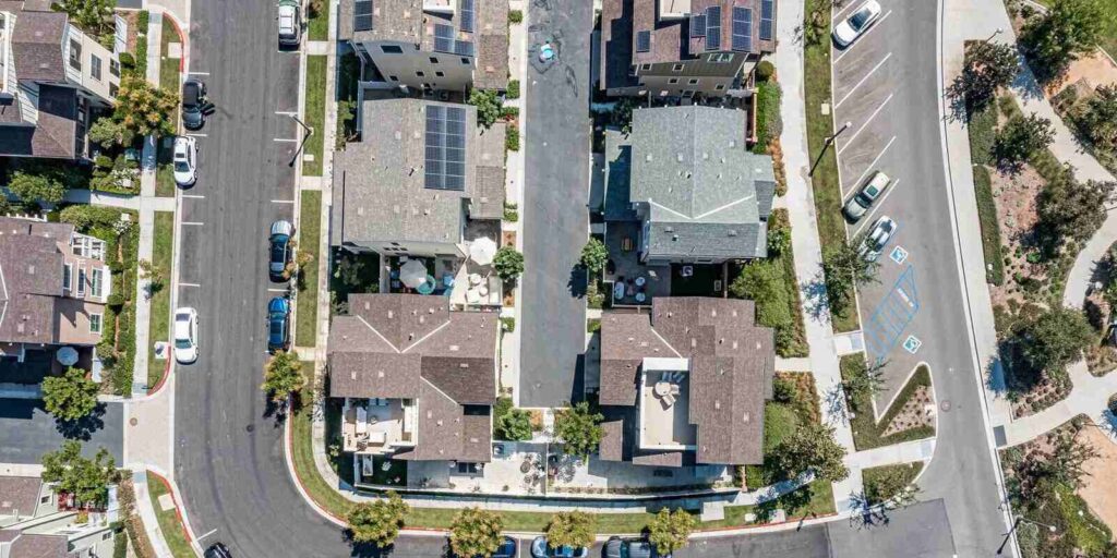 top down aerial view of a modern suburban neighborhood in California